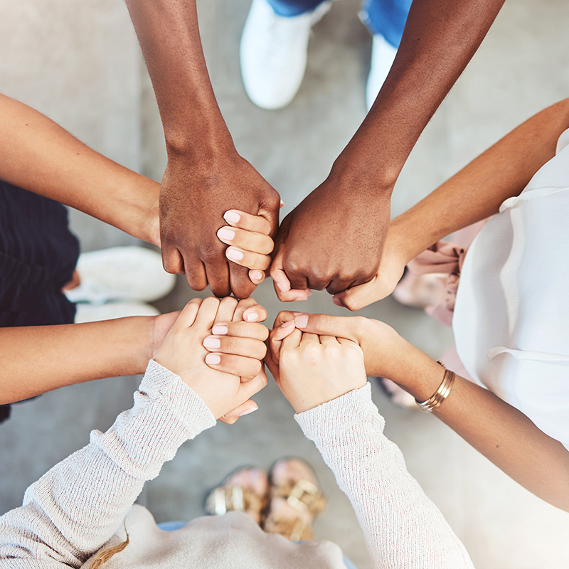Holding hands, faith and prayer support group of people or friends with hope, religion and trust or respect. Together, helping and love community with commitment, solidarity and teamwork from above